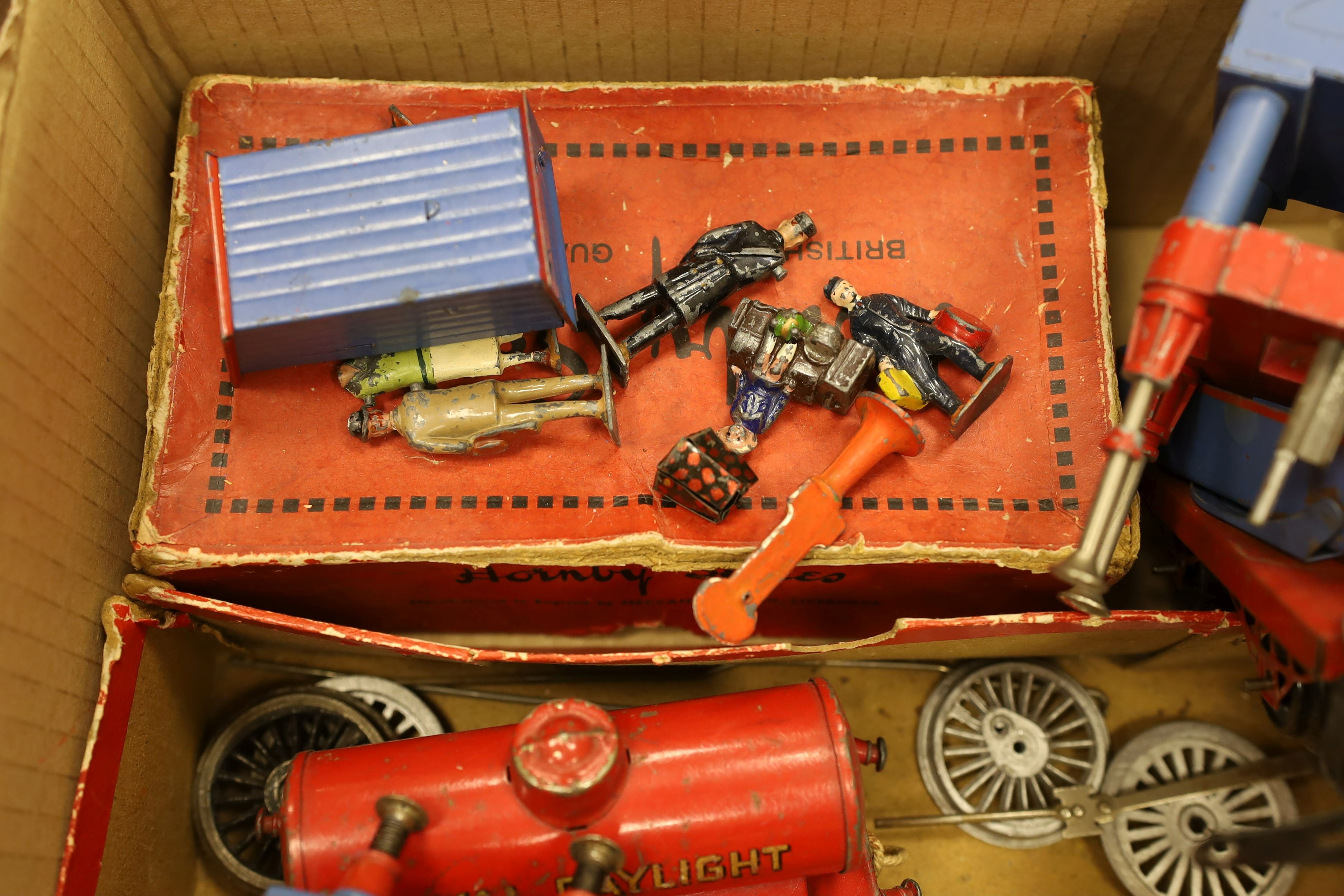A mixed quantity of Hornby model railway track, a metal crossing, an engine and other items